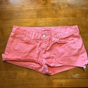 Pink denim cutoff shorts